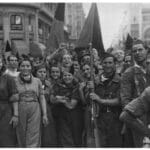 Anarchists militia from CNT march on the streets of Barcelona July 1936 during the Spanish Civil War. Photo: Unknown. Public Domain.