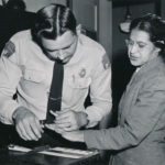 Rosa_Parks_being_fingerprinted_by_Deputy_Sheriff_D.H._Lackey_after_being_arrested_for_refusing_to_give_up_her_seat_for_a_white_passenger_on_a_segregated_municipal_bus_in_Montgomery,_Alabama
