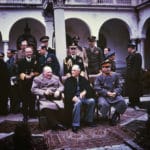 Yalta conference Churchill Stalin Roosevelt 1945 (The National Archives ref: INF 14/447). This Kodak Kodachrome photograph was not colorized. Public Domain.
