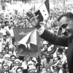 Egyptian President Gamal Abdel Nasser waving to crowds in Mansoura from a train car, 7 May 1960. Photo: Not credited/Bibliotheca Alexandrina. Public Domain.