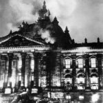 Firemen work on the burning Reichstag, February 1933. Photo: unknown, Item from Record Group 208: Records of the Office of War Information, 1926 – 1951. Public Domain.