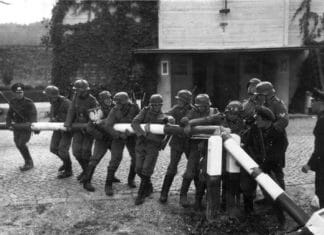 2. WW starts September 1. 1939 with Nazi-Germanys attack on Poland. Free City of Danzig police and custom officials reenact the removal of the Polish border crossing in Sopot on September 1, 1939. Photo: Hans Sönnke. Public Domain.