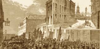 Socialist street meetings were held here during the 1880s and were addressed by Bernard Shaw, Eleanor Marx, William Morris and others. Engraving by JRR from The Graphic, 3 October 1885. Public Domain.