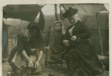Mother Jones (1837-1930) with the Miners' Children, 1912. Photo: Unknown. Publisher: Newberry Library. Public Domain.