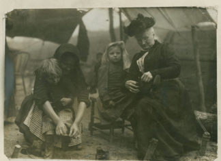 Mother Jones (1837-1930) with the Miners' Children, 1912. Photo: Unknown. Publisher: Newberry Library. Public Domain.