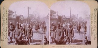 Company of Boxers, Tien-Tsin, China (photograph: The Whiting View Company, 1901). The Opium Wars and Boxer Rebellion were violent products of nineteenth-century contact between China and the West. Although British operations in China during the period are well documented, few photographs of the Chinese Boxer troops survive. Originating in the mid-nineteenth century, the stereograph was an ancestor of the newsreel, affording Americans a window on the remote corners of the globe. 1901. Source: Library of Congress. Author: Museum of Photographic Arts Collections. Publiuc Domain.