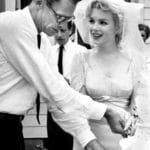 Marilyn Monroe and Arthur Miller at their wedding from the May 1961 issue of TV-Radio Mirror. Photo: Macfadden Publications New York, publisher of Radio-TV Mirror. Public Domain. Source: <a href="https://commons.wikimedia.org/wiki/File:Monroe_Miller_Wedding.jpg">Wikimedia Commons</a>.