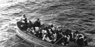 Titanic. Last lifeboat arrived, filled with Titanic survivors. This photograph was taken by a passenger of the Carpathia, the ship that received the Titanic's distress signal and came to rescue the survivors. It shows the last lifeboat successfully launched from the Titanic. Date: 15 April 1912 (original photo taken). Photo: passenger on the Carpathia. Public Domain.