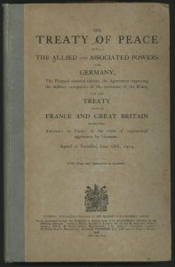 The cover of a publication of the Treaty of Versailles in English. Signed at Versailles, June 28th, 1919. Source: Auckland War Memorial Museum http://www.aucklandmuseum.com/collections-research/collections/record/am_library-catalogq40-15812 Authors: David Lloyd George, Woodrow Wilson and Georges Clemenceau. Public Domain.