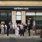 Small line of customers outside a branch of Northern Rock – a Mortgage specialist and a top UK mortgage lender – in North Street, Brighton, East Sussex. The business (a former “savings and loan” type Building Society which was demutualised in 1997) has been affected in part by problems in the US “subprime” lending market. Picture taken late on Friday afternoon on 14th September 2007. Photo: Dominic Alves from Brighton, England. (CC BY 2.0).