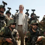 NATO Secretary General Anders Fogh Rasmussen, poses with a Afghan special forces at Camp Morehead, Afghanistan, April 12. 2012. Photo: Taken by ResoluteSupportMedia /  Maitre Christian Valverde, French Navy, ISAF Public Affairs Office. (CC BY 2.0).