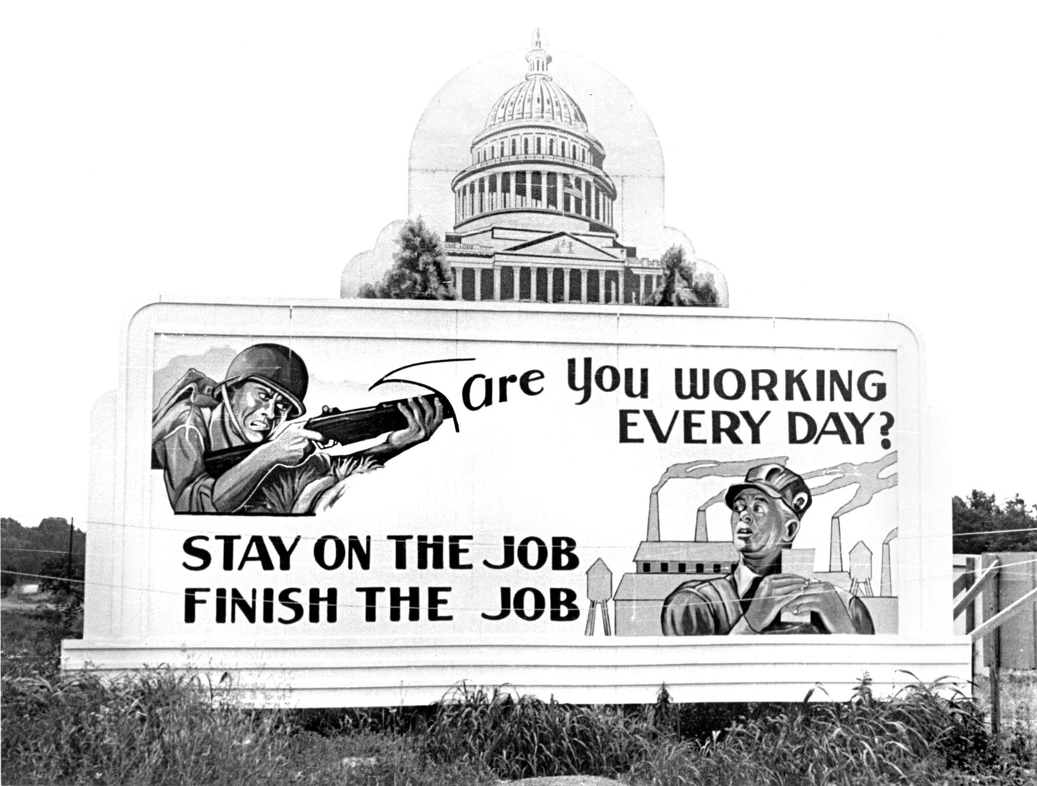 Billboard from 1944 Oak Ridge, Tennessee, USA. Photo: Ed Westcott 6-5-1944 Oak Ridge Tennessee. Public Domain.