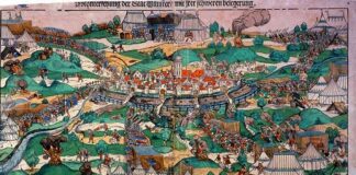 The city of Münster under siege by prince bishop Franz von Waldeck in 1534. The picture shows the first attack at Pentecost. The text below the image says: "A verzeychnung der Stat Munster with every opportunity / mauren / thüren / pinnacles / wading / closets / pasteyen / unnd geweren / watergreben. Also like that of irem Bischoff on the Friday before Pentecost / MD xxxiiii. Jars berennt / (and?) Zibben casual ringhweis .... to hand over / and afterwards ran to Sant Egidien evening at five locations / and were violently stormed. as some say / at three thousand! God ..." Colored woodcut with type printing from 1535 by Erhard Schoen (c. 1491–1542), German woodcut designer and painter. Collection: Westphalian State Museum for Art and Cultural History, Münster. Public Domain.