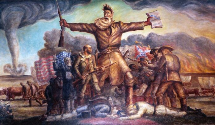 Tragic Prelude. A mural in the Kansas State Capitol. He carries in one hand a Bible and in the other a Beecher's Bible (rifle). Union and Confederate forces are fighting, with casualties. A tornado approaches in the background, as does a prairie fire, both common in Kansas. Oil and tempera painted in 1938 by John Steuart Curry (1897–1946), American painter and printmaker. Collection: Kansas State Capitol, USA. Public Domain.