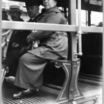 Emma Goldman on a Street Car, From the Bain Collection (Library of Congress), 1917. Photograph by Bain News Service. Public Domain.