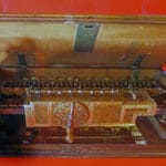 The Staffelwalze, or Stepped Reckoner, a digital calculating machine invented by Gottfried Wilhelm Leibniz around 1672 and built around 1700. It was the first known calculator that could perform all four arithmetic operations; addition, subtraction, multiplication and division. 67 cm (26 inches) long. Only two machines were made. Collection: Museum Herrenhausen Palace, Hanover, Germany. Photo: Hajotthu. (CC BY-SA 3.0).