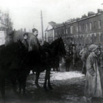 Red Army troops enter Kronstadt after the liquidation of the Kronstadt Kronstadt rebellion. Left: Ivan Fedko. Center: Pavel Dybenko. 18 March 1921. Photo: Unknown. Public Domain.
