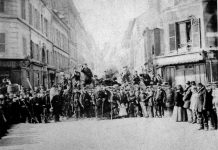 Barricade rue Saint-Sébastien at the crossroads with boulevard Richard-Lenoir. Photo: Unknown. Collection: Historical library of the City of Paris. Public Domain.