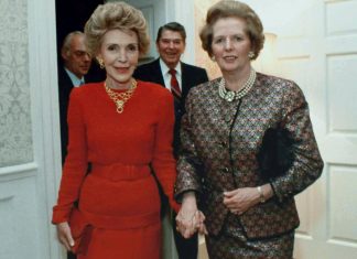 Margaret Thatcher and Nancy Reagan at 10 Downing Street. President Ronald Reagan is behind, in between the two, and Mr. Denis Thatcher is to Mr. Reagan's left. 2 June 1988. Photo: White House photo office, Source: http://www.margaretthatcher.org/multimedia/displaydocument.asp?docid=109673 Public Domain