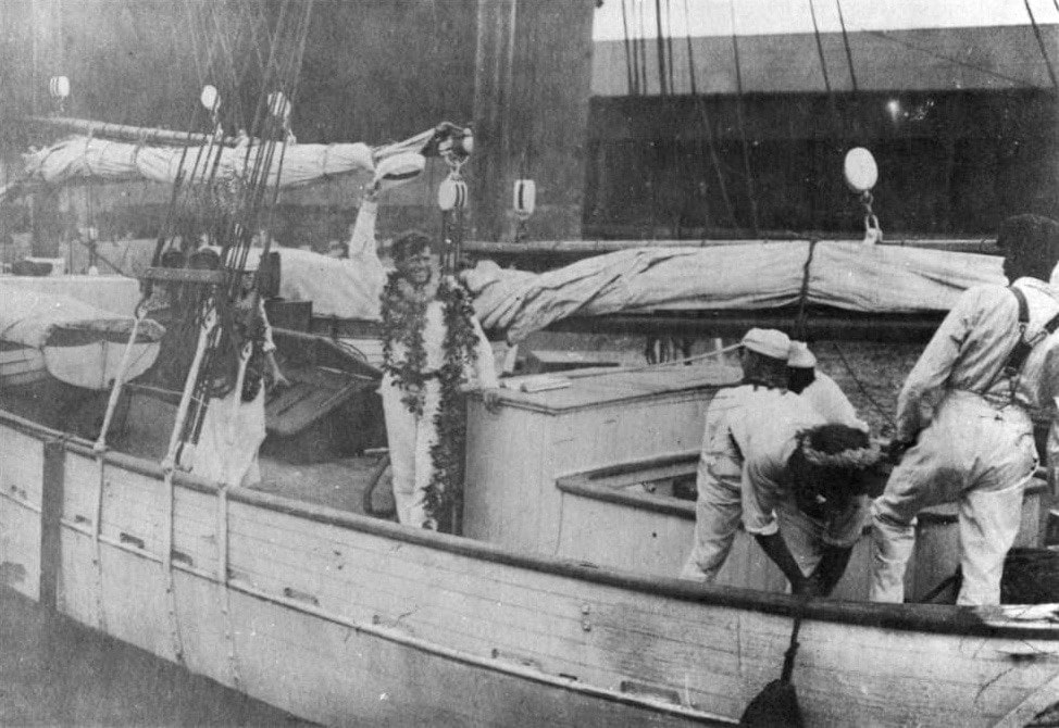 Jack London with maile lei in Hawaii, before 1916. Photo: Unknown. Public Domain.