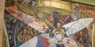 "El hombre controlador del universo" , or also known as "El hombre en el cruce de caminos" a fresco painting with dimensions of 4.80 × 11.45 m, made by Diego Rivera. This painting is located in the Palacio de Bellas Artes, in CDMX. Photo: Taken 6 July 2019 by Renata Frias. (CC BY-SA 4.0).