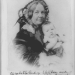 Elizabeth Cady Stanton holding her daughter Harriot, half-length portrait, facing right. (cropped). Between 1890 and 1910 of daguerreotype taken 1856. Photo: Unknown. Public Domain.