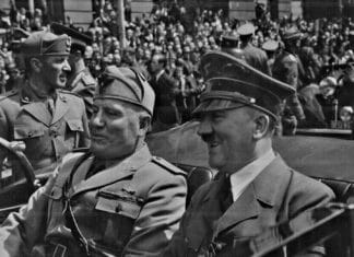 Hitler_and_Mussolini_in_Munich,_Hitler and Mussolini in Munich, Germany, circa June 1940. Eva Braun's Photo Albums, ca. 1913-ca. 1944. General Services Administration, U.S. National Archives and Records Service. Office of the National Archives, ca. 1949-1985. Record Group 242: National Archives Collection of Foreign Records Seized, 1675-1958. Public Domain.