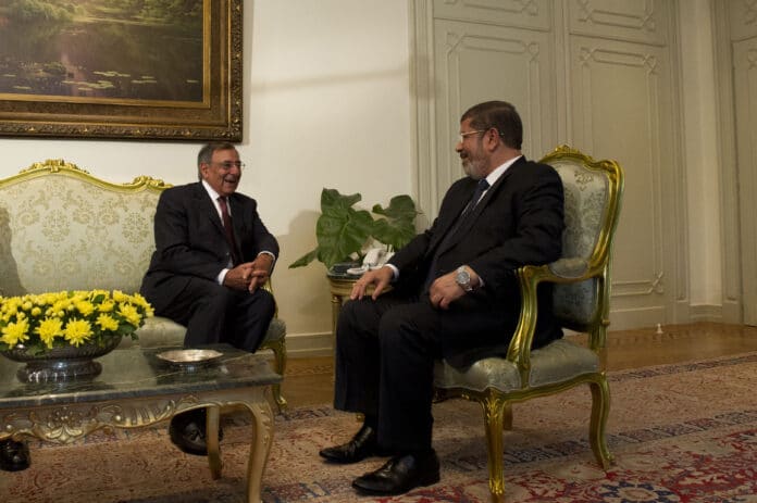 US Secretary of Defense Leon E. Panetta, left, meets with Egyptian President Muhammad Mursi in Cairo, Egypt, July 31, 2012. Panetta is on a 5-day trip to the region, stopping in Tunisia, Egypt, Israel and Jordan to meet with senior leaders and counterparts. Photo: Erin A. Kirk-Cuomo / www.defense.gov. Public Domain.