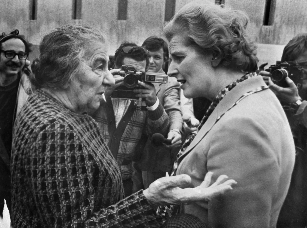 Two Iron Ladies - the zionist Golda Meir and the neoliberalist Margaret Thatcher, April 1976, Tel Aviv. Photo: Levan Ramishvili. Public Domain.