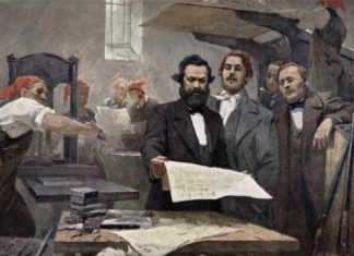 Marx & Engels blev på Komunisternes Forbunds kongres i London pålagt at formulere et programskrift, Det Kommunistiske Manifest. Her er de 2 malet i Rheinische Zeitung's trykkeri, ca. 1849. Oliemaleri på lærred af E. Capiro. Public Domain. Se nedenfor 1. juni 1847.