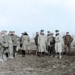 British troops from the Northumberland Hussars, 7th Division, Bridoux-Rouge Banc Sector and German soldiers and medical personnelmeeting in No-Mans’s Land during the Christmas truce, 25th December 1914. Colorized photo: Cassowary Colorizations. (CC BY 2.0)