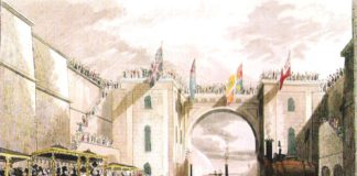 When The Economist was started in 1843, the industrial revolution was ongoing, and the first trains were combining cityes. Here The Duke of Wellington's train being prepared for departure from Liverpool to Manchester, 15 September 1830. Original artist unrecorded; reproduced Gibbon, Richard (2010) Stephenson's Rocket and the Rainhill Trials, Oxford: Shire Books. Public Domain. Se below 2 september 1843.