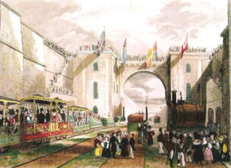 When The Economist was started in 1843, the industrial revolution was ongoing, and the first trains were combining cityes. Here The Duke of Wellington's train being prepared for departure from Liverpool to Manchester, 15 September 1830. Original artist unrecorded; reproduced Gibbon, Richard (2010) Stephenson's Rocket and the Rainhill Trials, Oxford: Shire Books. Public Domain. Se below 2 september 1843.