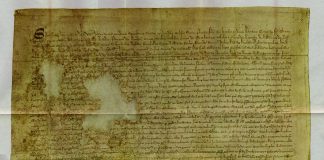 Reproduction of the "Tyninghame" (1320 A.D) copy of the Declaration of Arbroath. 1320 (manuscript): Author: Scotland barons. Public Domain.