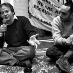David Graeber, left, speaks at the Maagdenhuis occupation at the University of Amsterdam 7 March 2015. Photo: Guido van Nispen. (CC BY 2.0).